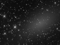 dim galaxy NGC 147 in luminance